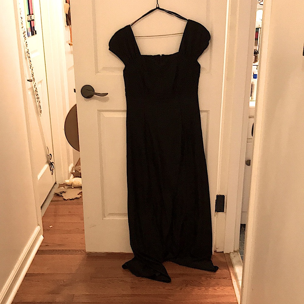 NWT, off the shoulders Sofia black dress. Small circular sequence on the front.